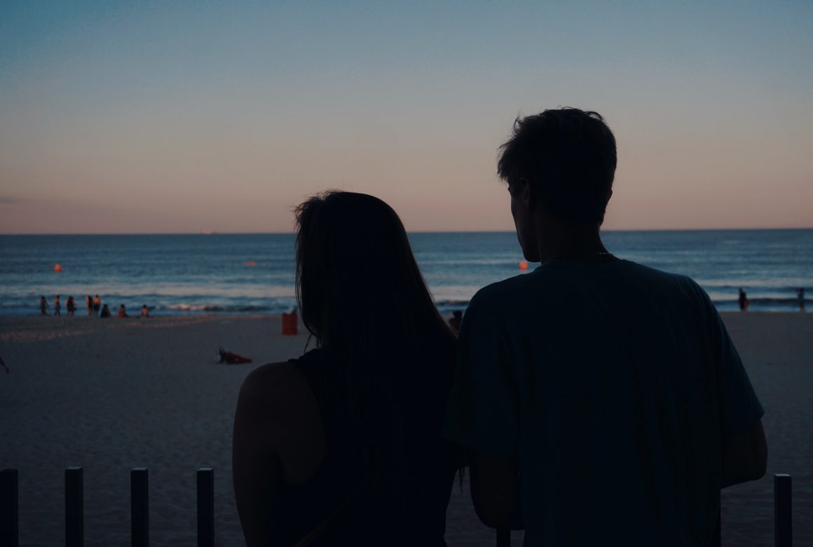 DONE! 12 Signs Revealing He's Pretending Not To Like You (And 4 Reasons Why)