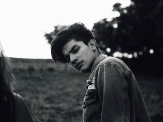 he stares into my eyes without smiling