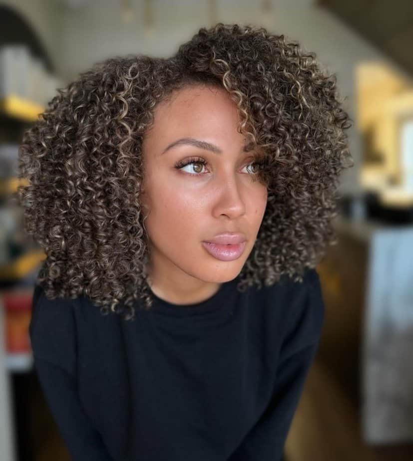 10. Rich curly style with lots of volume