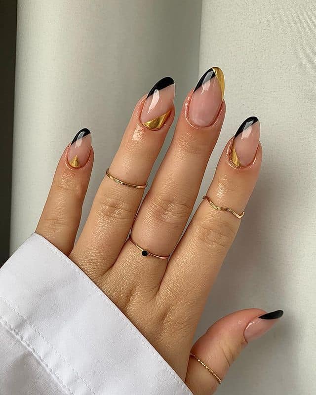Gorgeous black and gold nails