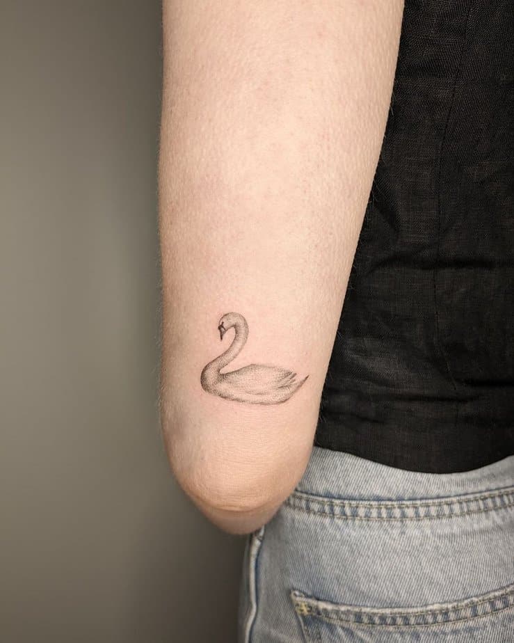 20 Captivating Swan Tattoos For A Graceful Appearance