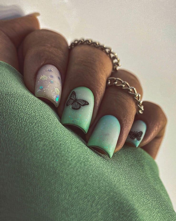 10. Seafoam green butterfly nails