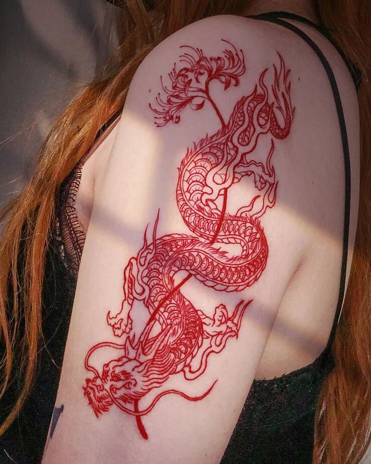 11. Red dragon entangled in a flower
