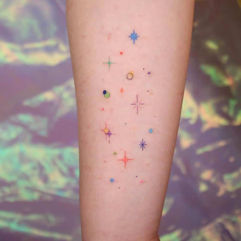 13. A set of colorful sparkles on the forearm
