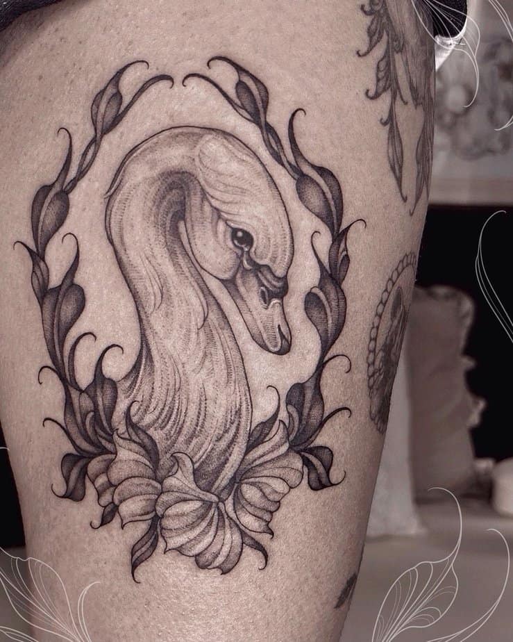 14. Romantic swan tattoo