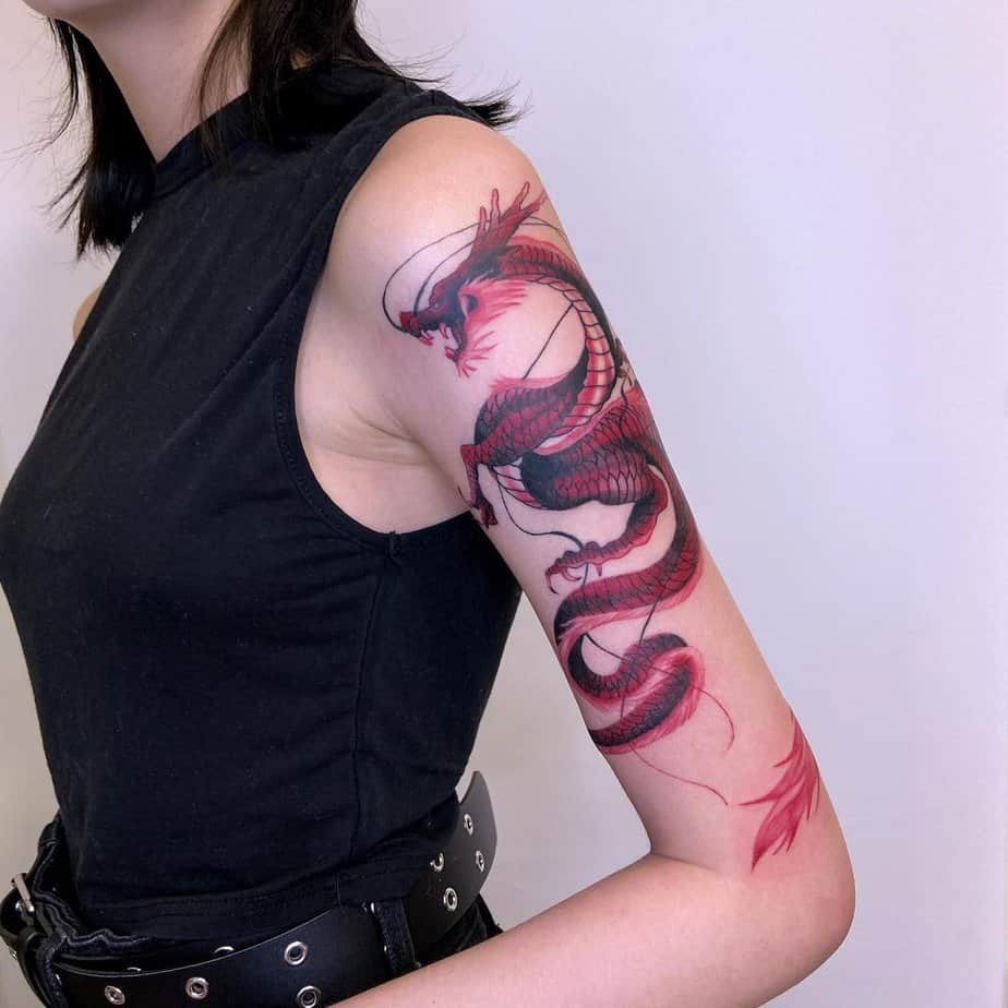 16. A sharp red dragon tattoo

