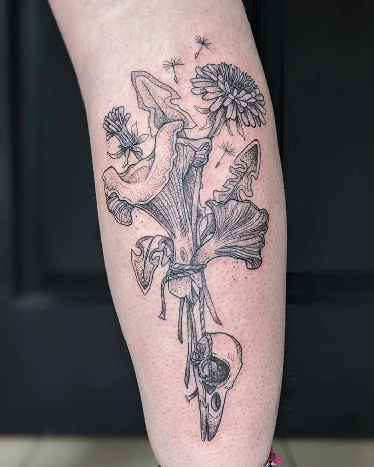 16. Black and gray dandelion tattoo
