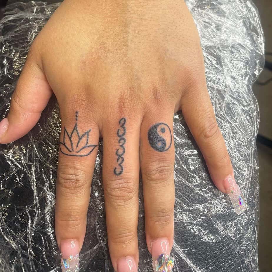 16. Middle finger tattoo