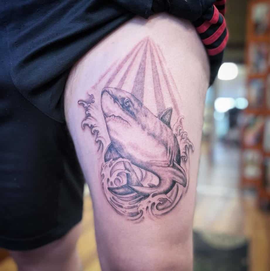 16. Stunning shark thigh tattoo for men