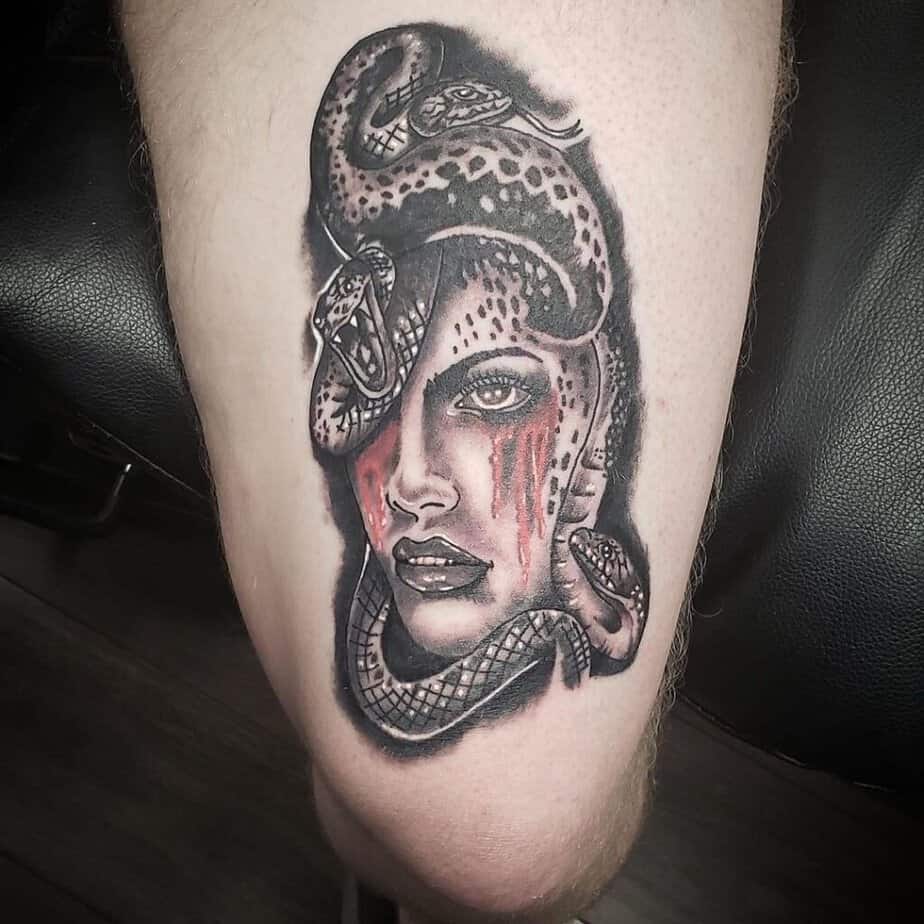 6. This Medusa tattoo will turn everyone who looks at you into stone