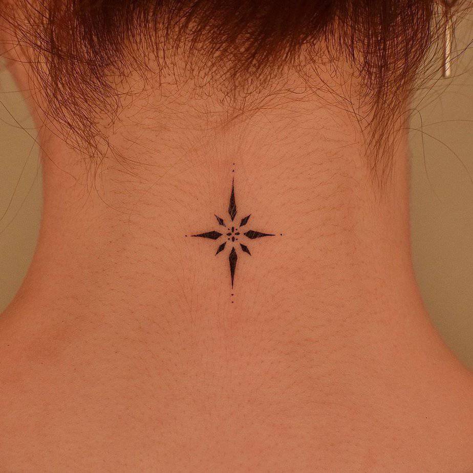 18. A sparkle tattoo design on the neck
