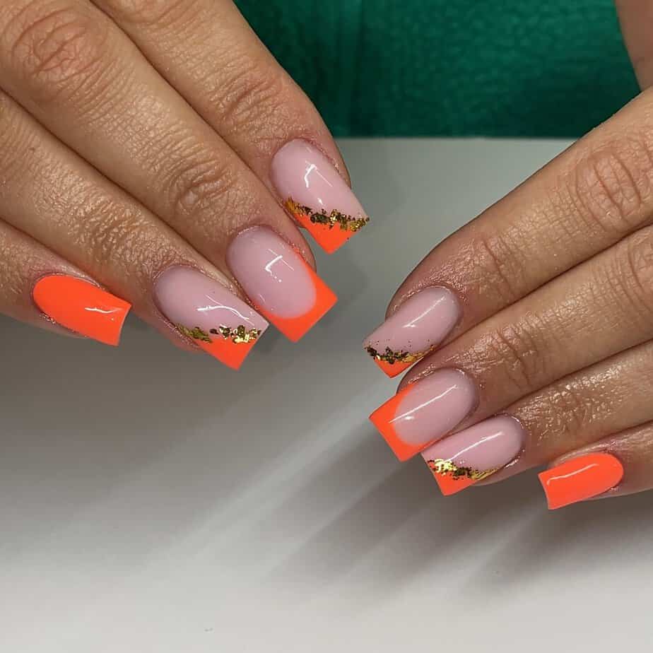 2. Golden orange nails