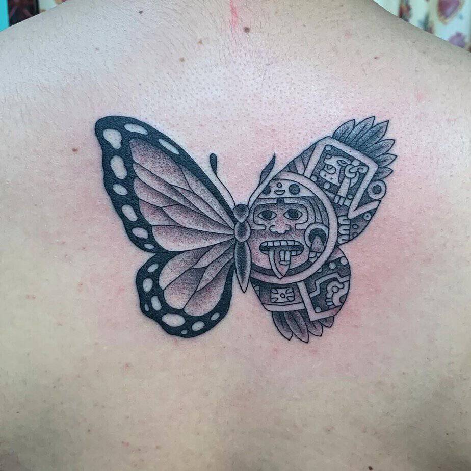 2. Mesmerizing Aztec butterfly back tattoo