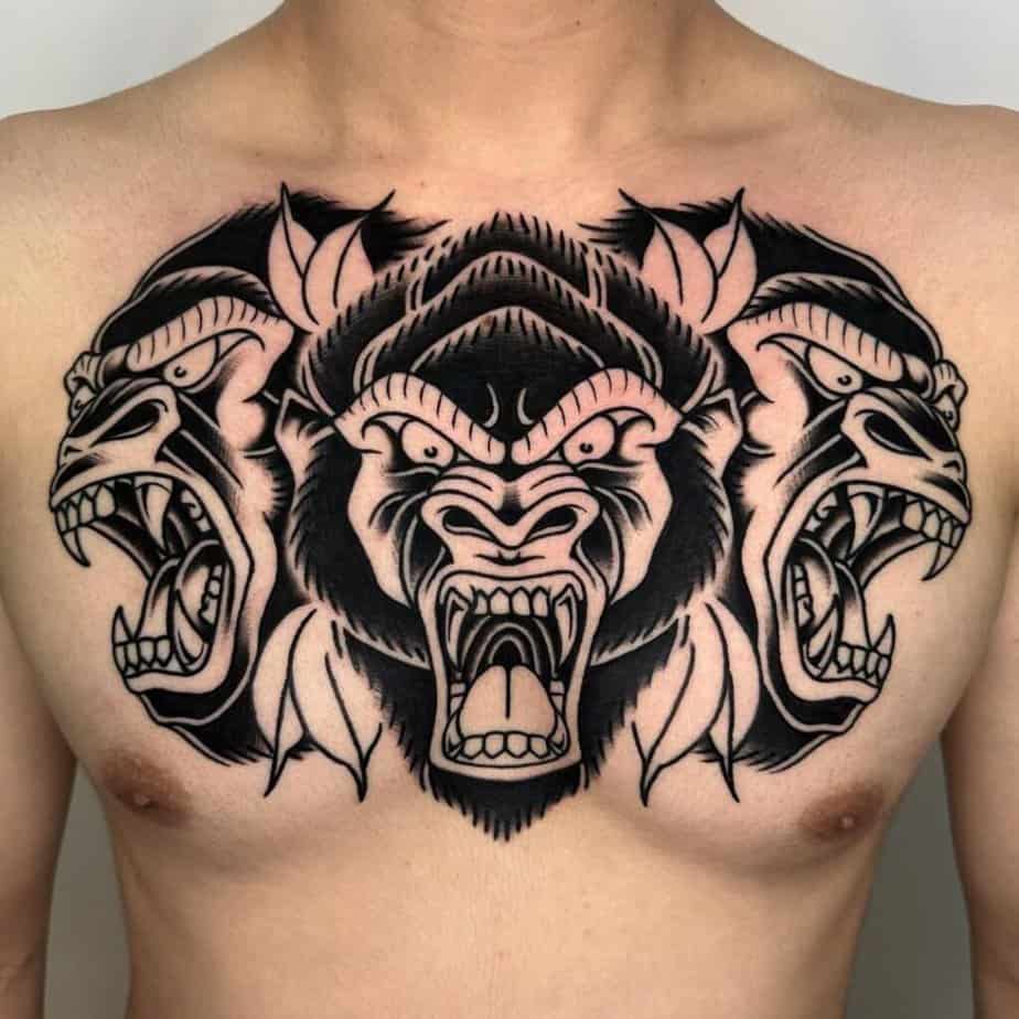 15. A three-headed gorilla tattoo on the chest