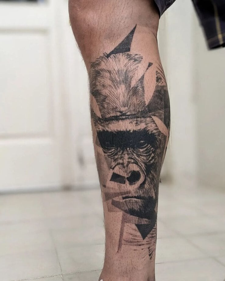 6. An abstract gorilla tattoo on the leg