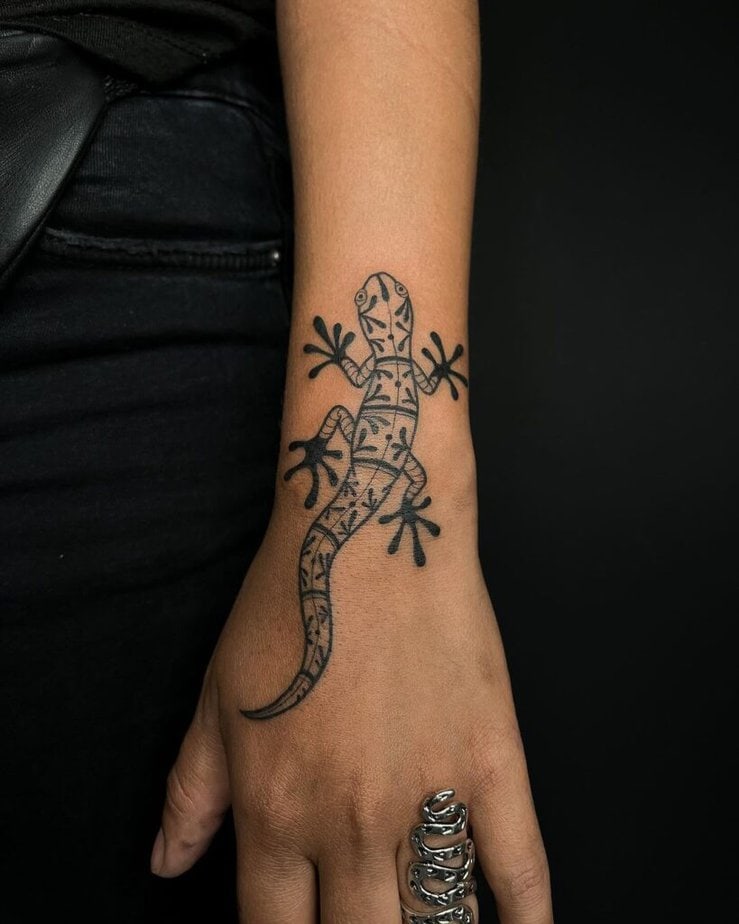 19. A lizard tattoo