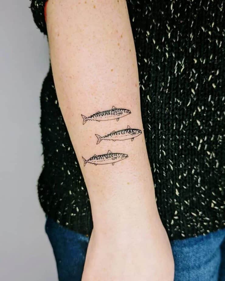 9. A fish tattoo
