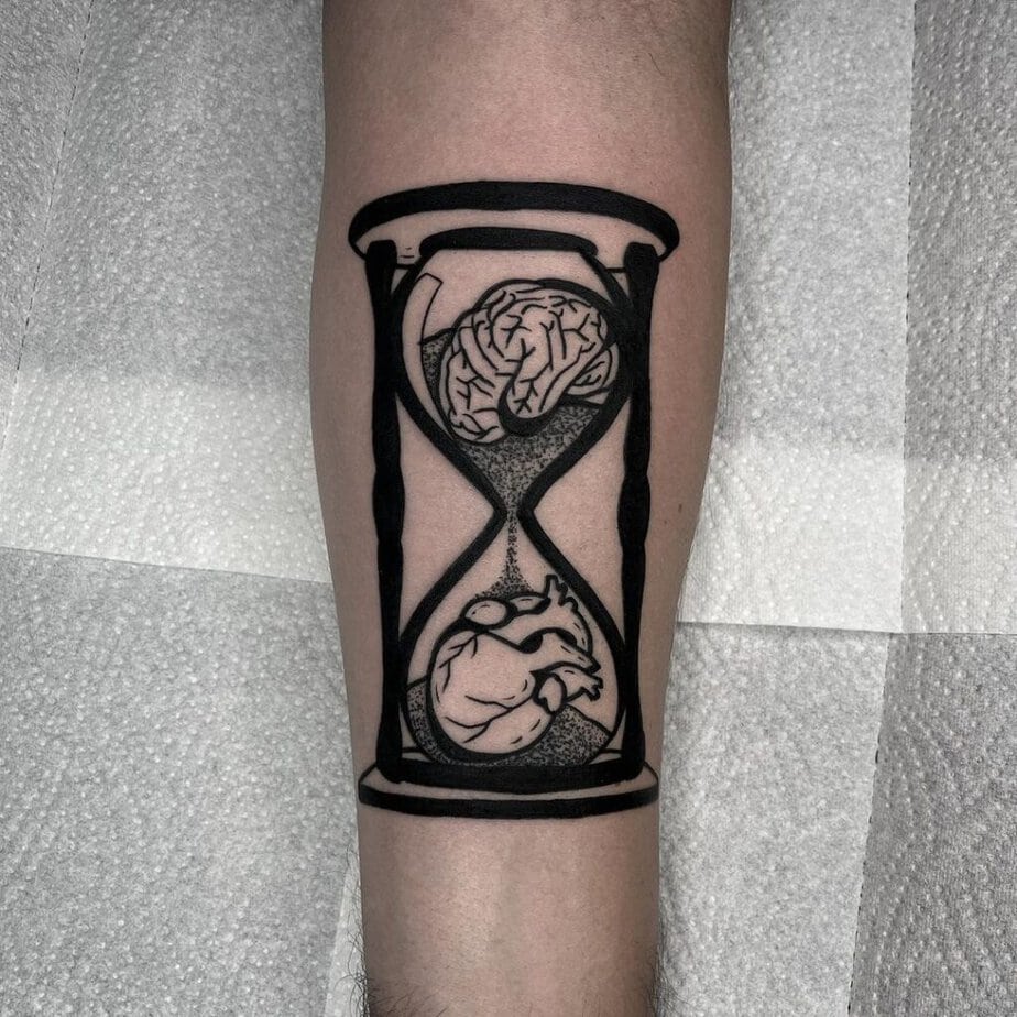 2. Mind over matter hourglass tattoo