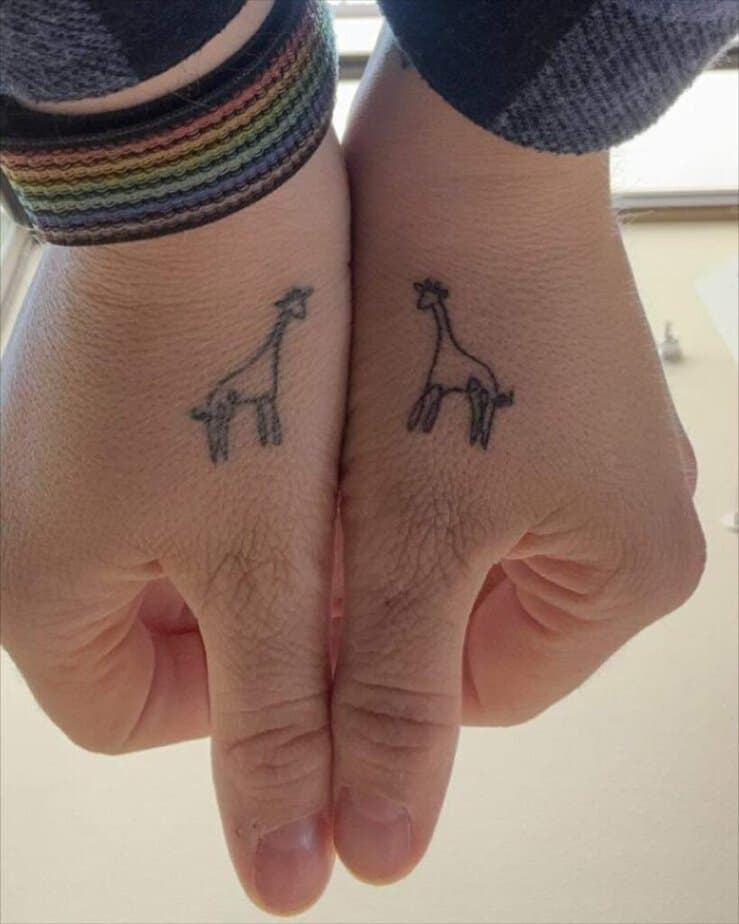2. Matching giraffe tattoos