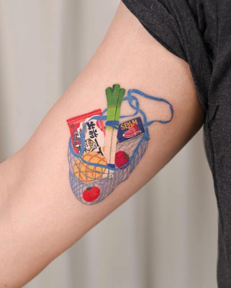 1. A colorful food tattoo on the arm