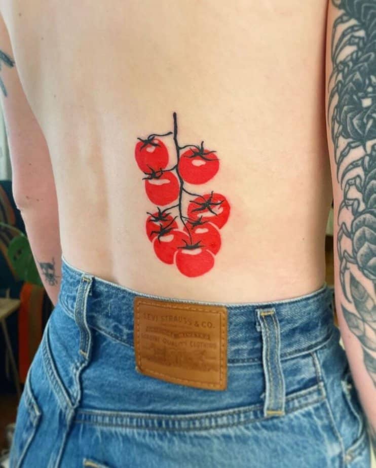 10. A tomato tattoo on the back 