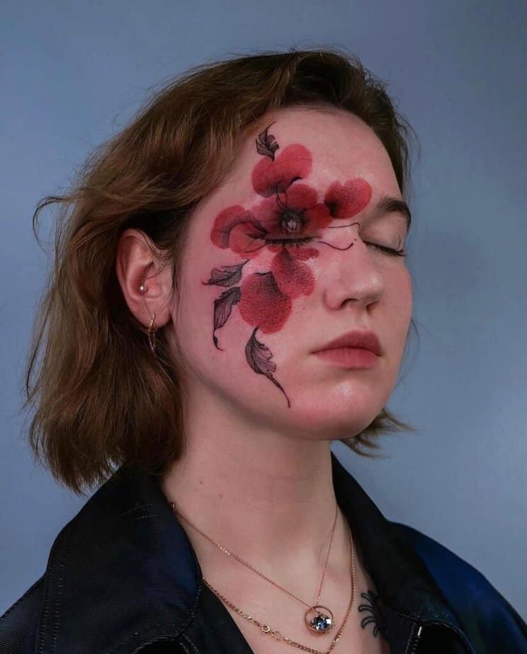8. A peony tattoo that stretches across the face 