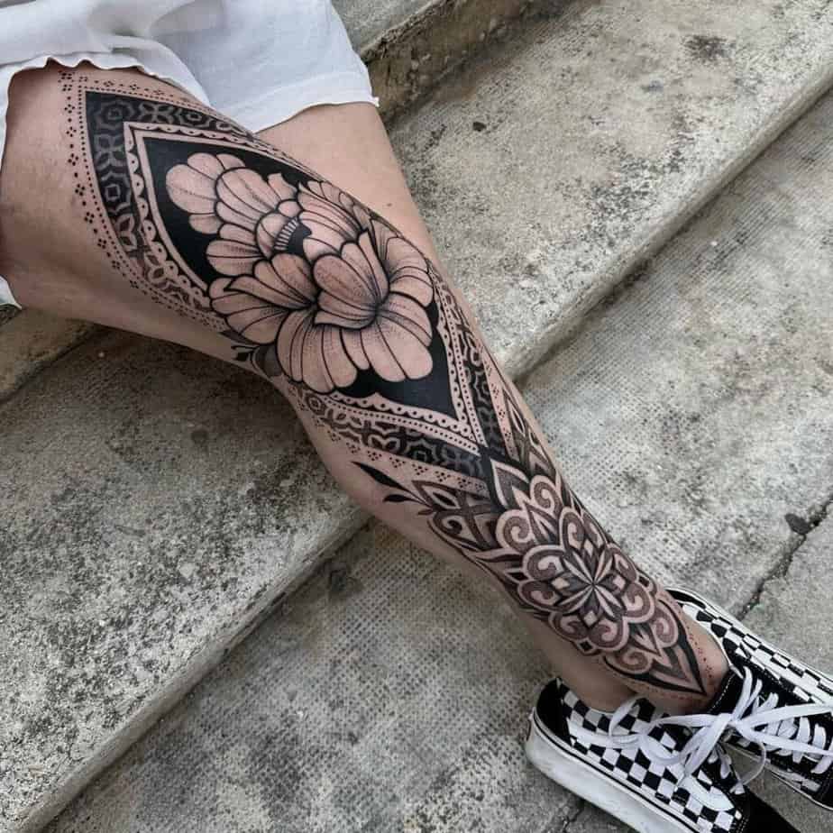 3. Ornamental tattoo with added flowers