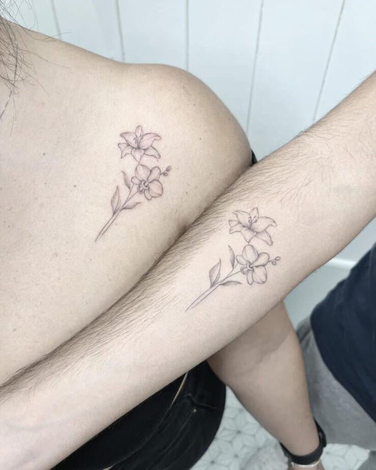 17. Matching flower tattoos