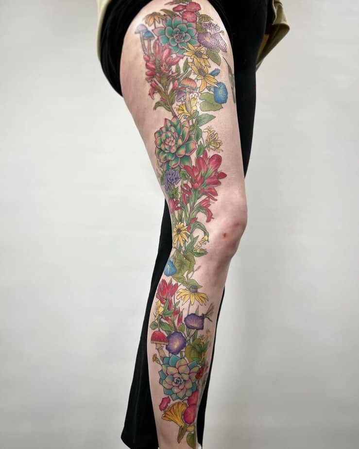 17. Colorful floral tattoo