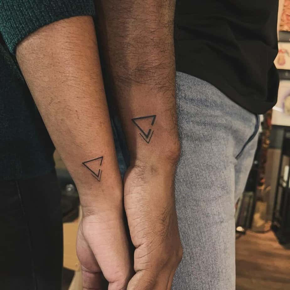 12. A matching triangle tattoo 
