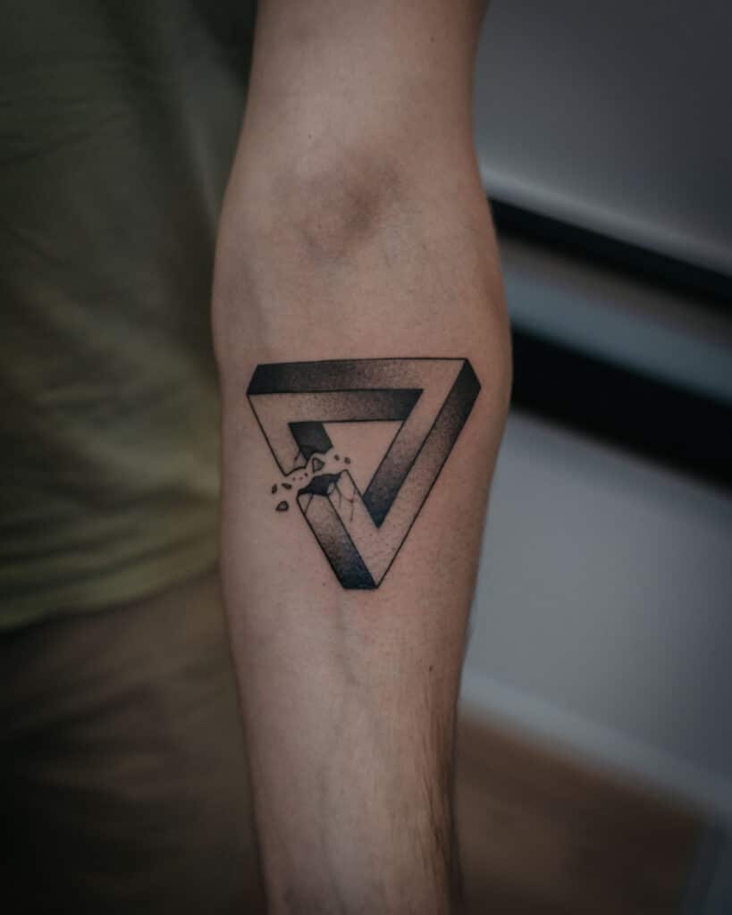 7. A broken Penrose triangle tattoo 