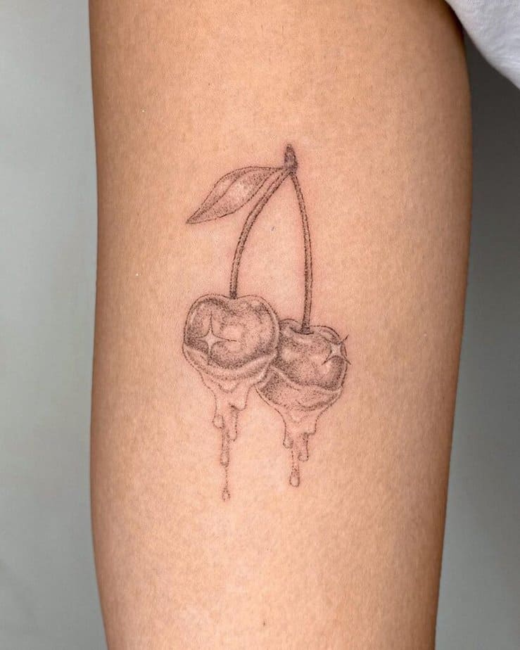 14. Dotwork cherry tattoo