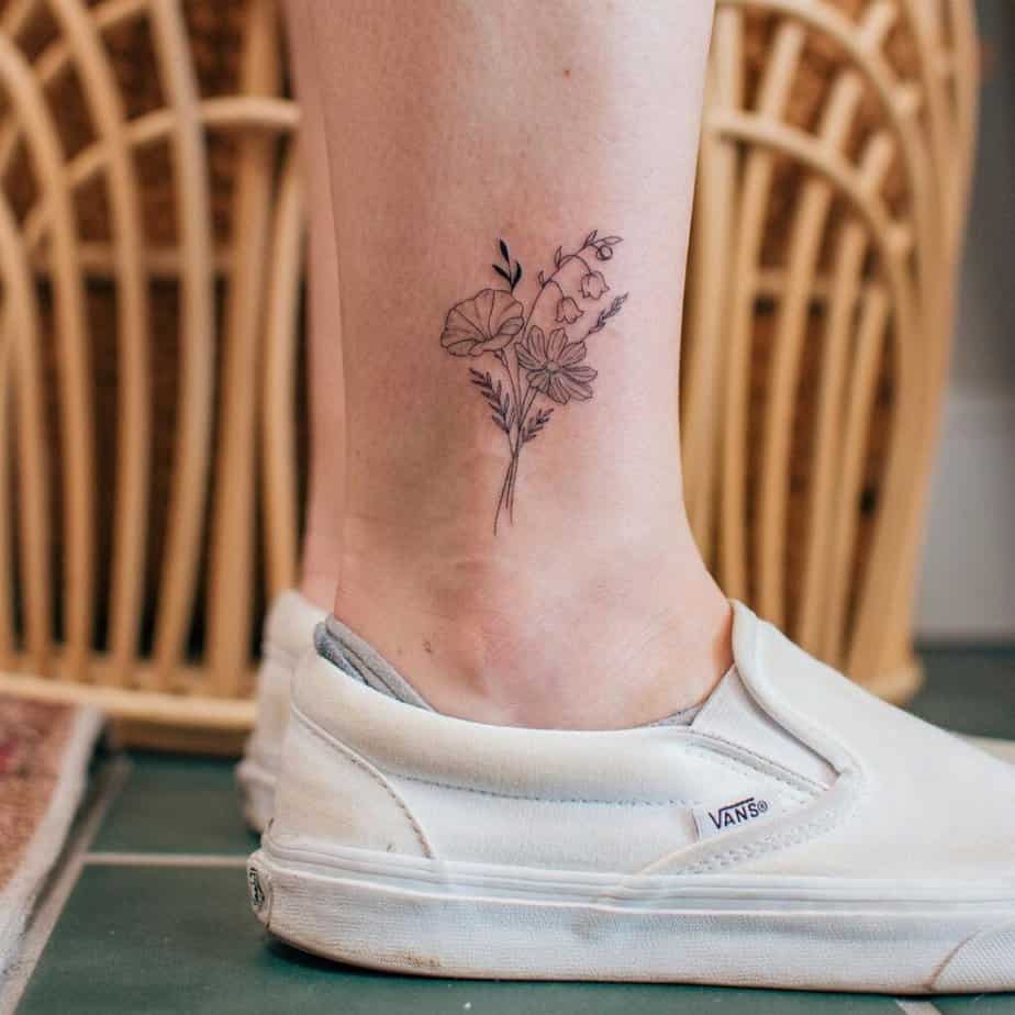 1. Cute ankle flower tattoos