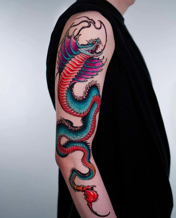 19. A colorful cobra tattoo 
