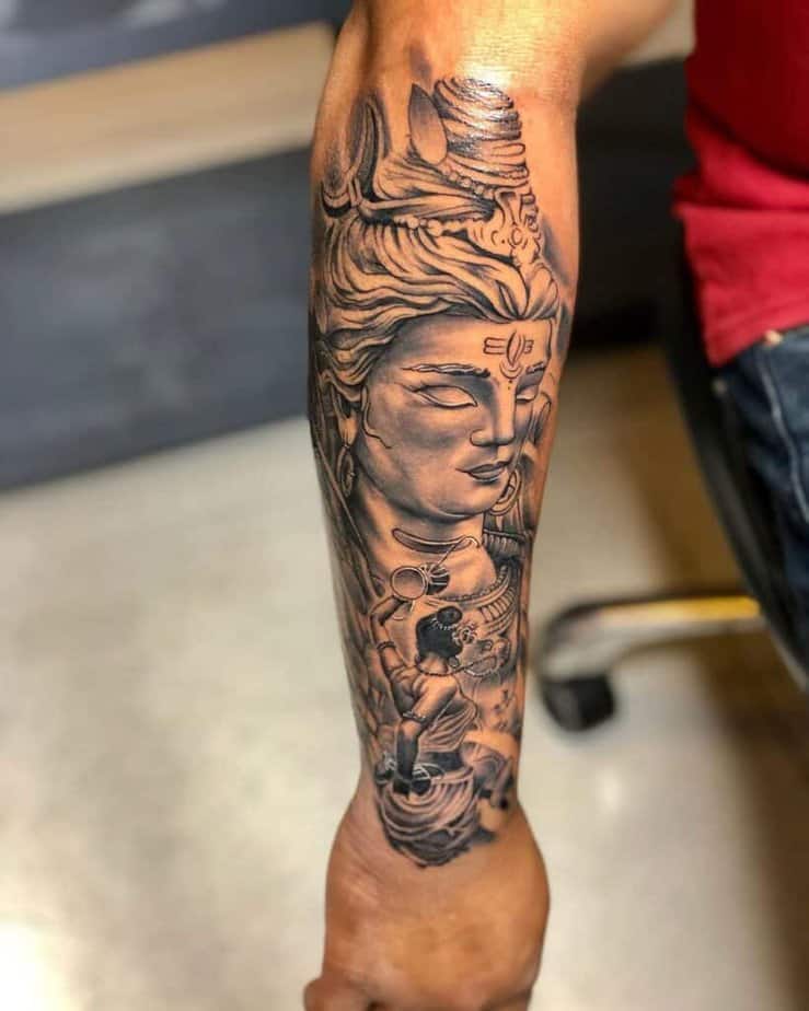 1. A Shiva tattoo on the arm