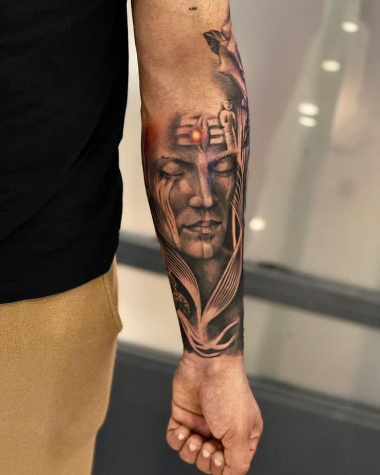 14. A Shiva tattoo on the inside of the arm