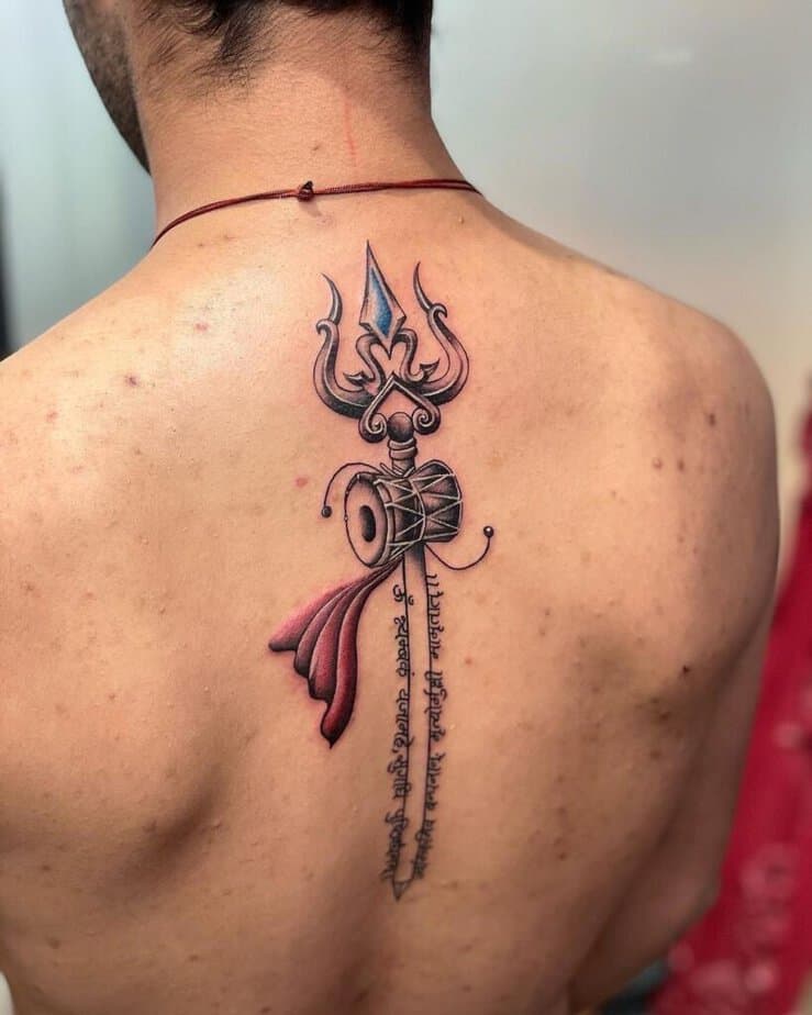 15. A Shiva tattoo on the back 