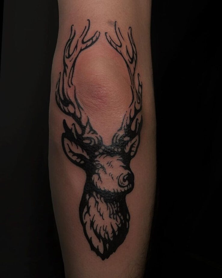 20. A deer tattoo on the elbow