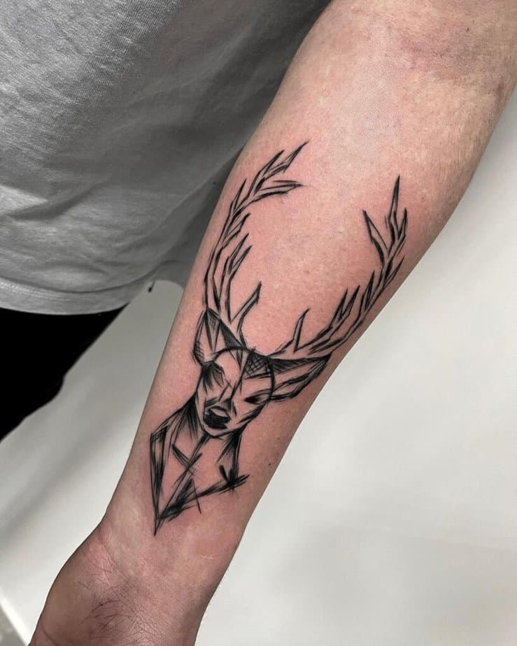 3. A sketch-style deer tattoo 