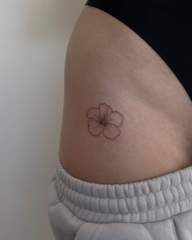3. A hibiscus tattoo