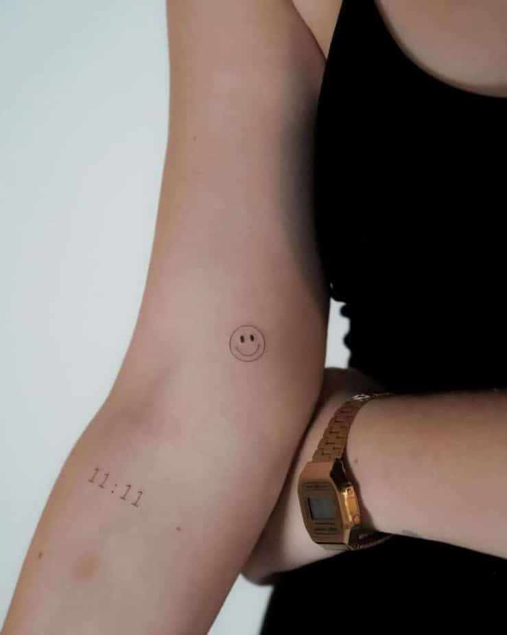 6. A single-needle smiley face tattoo 