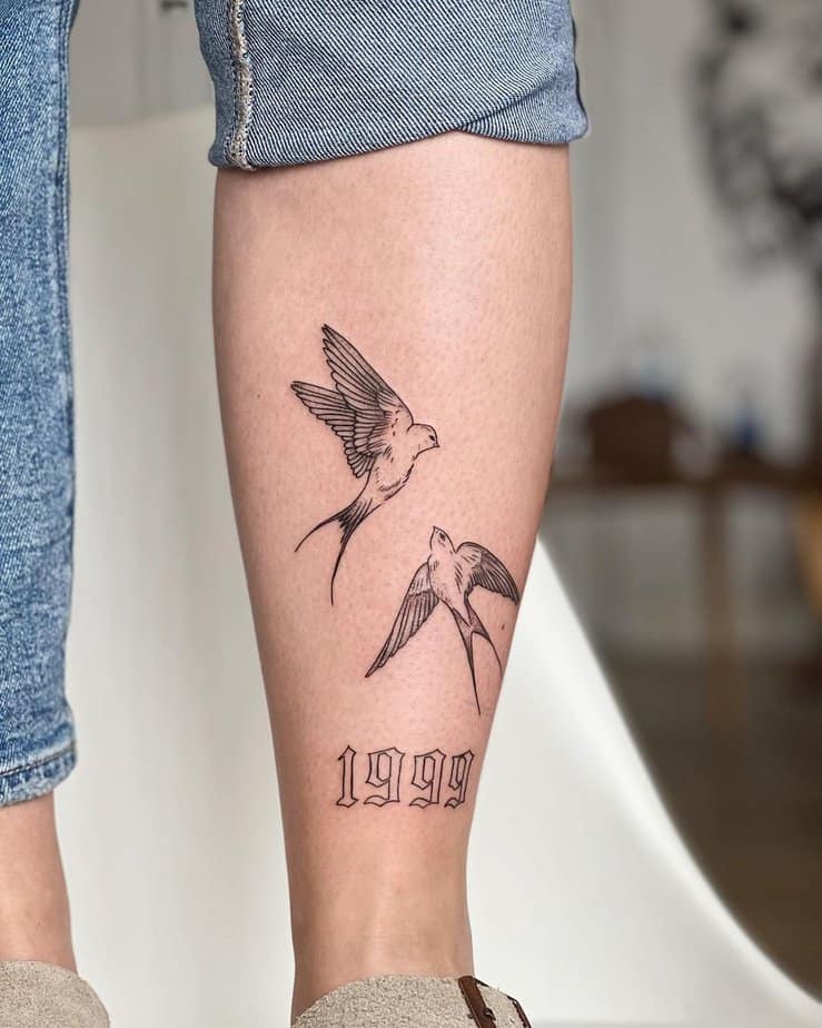16. A sparrow tattoo on the leg

