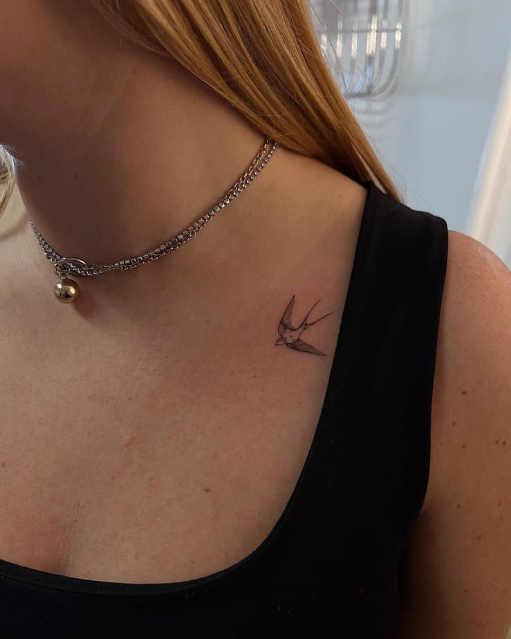 6. A tiny sparrow tattoo on the collarbone
