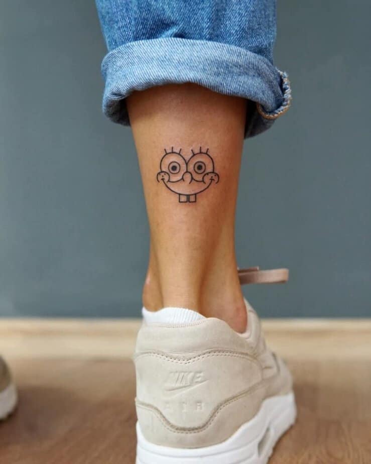 1. A linework SpongeBob tattoo on the ankle  