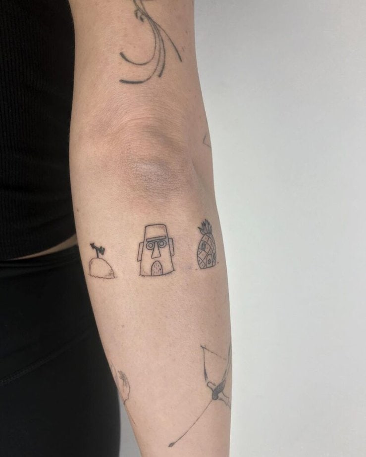 11. A Bikini Bottom tattoo on the back of the arm
