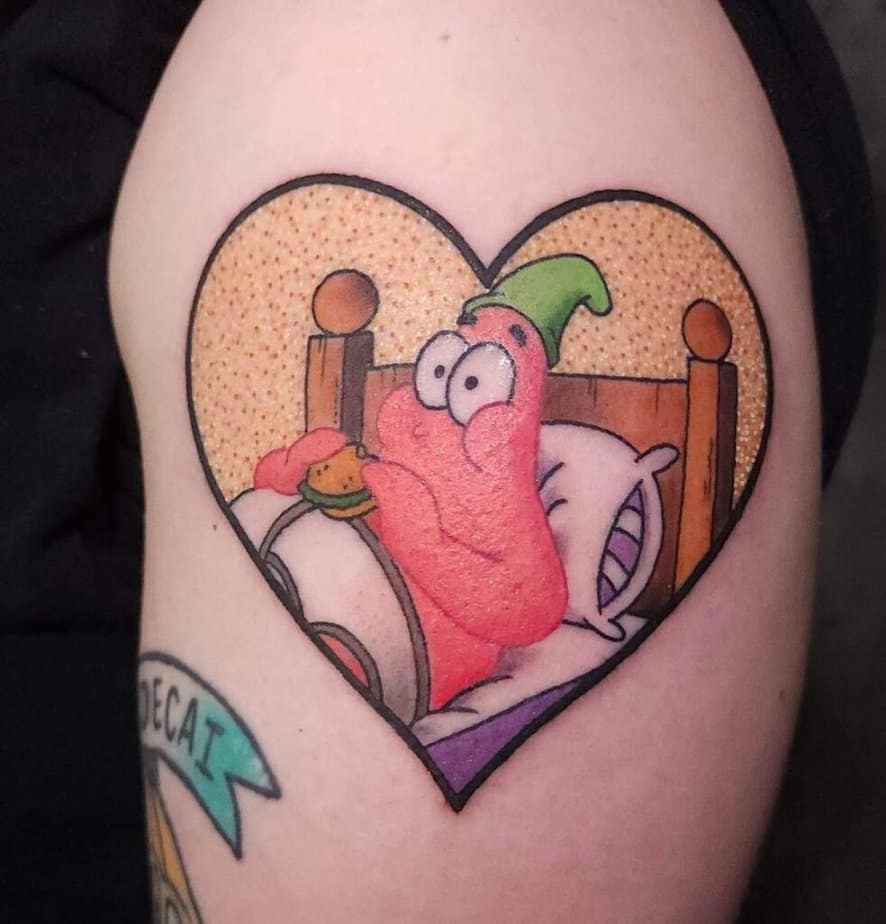 15. A tattoo of Patrick on the upper arm