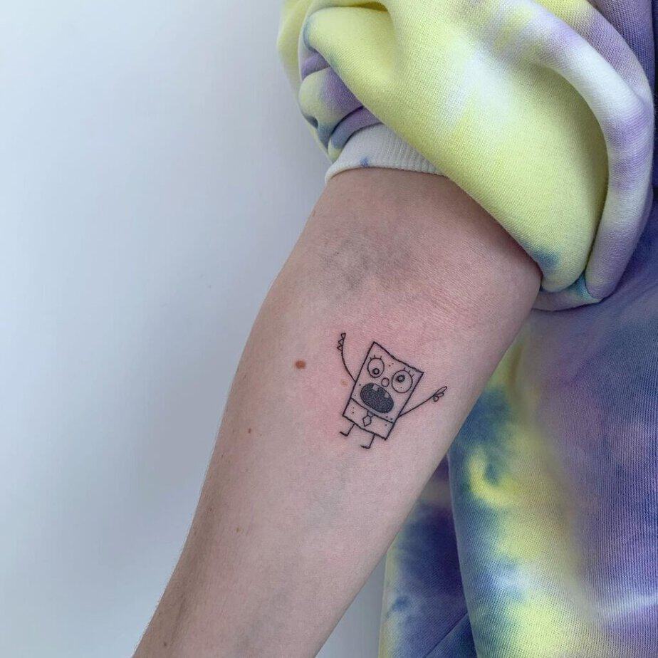7. A doodle tattoo of SpongeBob on the forearm