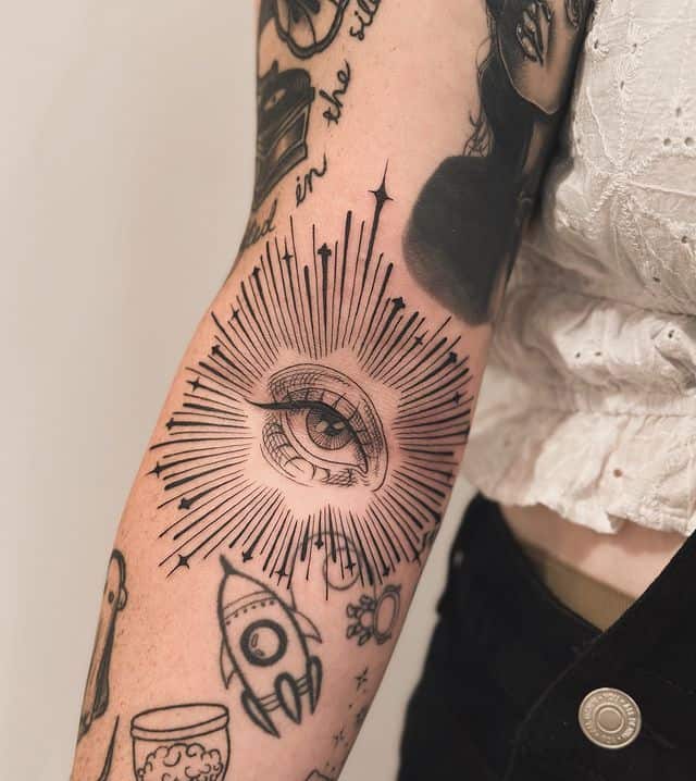 15. Elbow Gothic Eye Tattoo