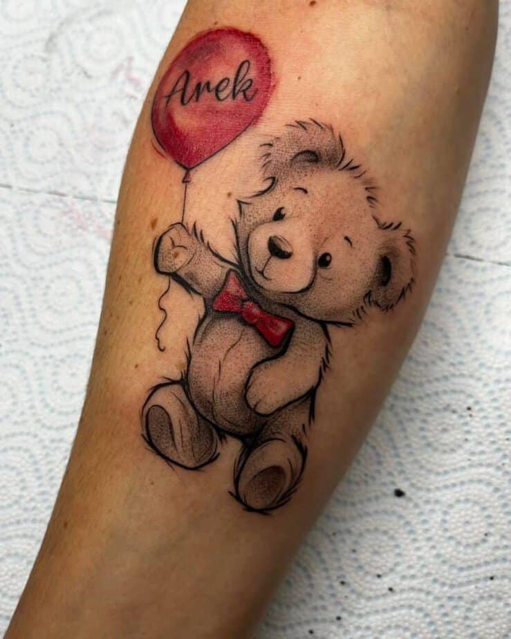 18. Teddy bear with a balloon