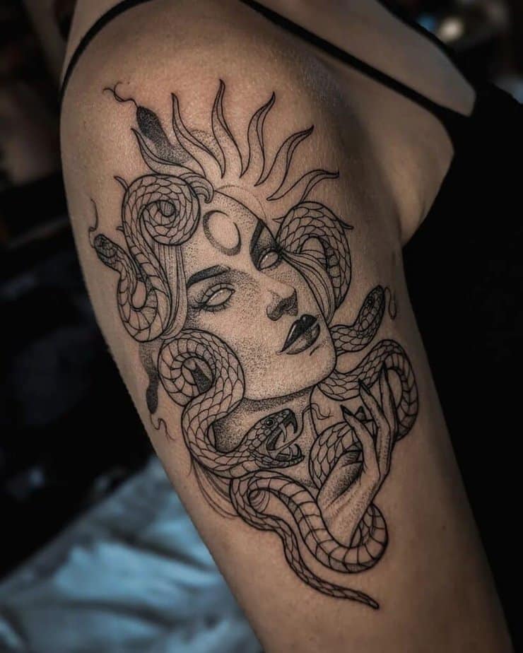 15. Dotwork medusa upper arm tattoo